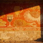 roman empire discoveries 2026 - vivid Pompeii dining room wall fresco showing red and ochre food items