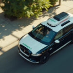 robotaxi deployment 2026 - Waymo driverless Jaguar I-PACE robotaxi in downtown Phoenix